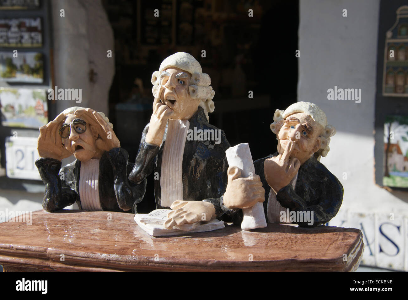 Humorous model variation with three wise judges see no evil speak no evil hear no evil Bruges Belgium Stock Photo