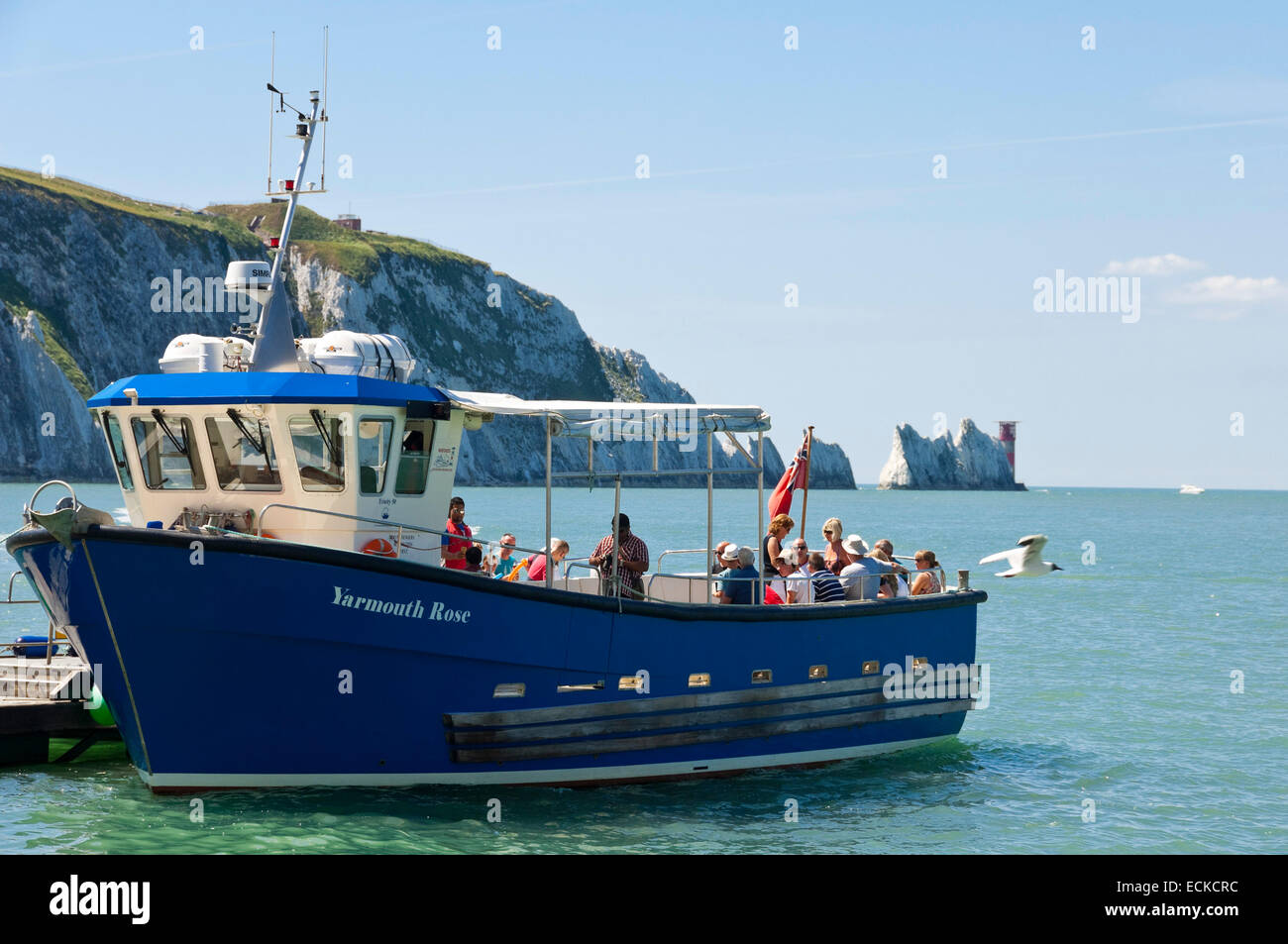 Horizontal view of a tour boat at the Needles in the Isle of Wight. Stock Photo