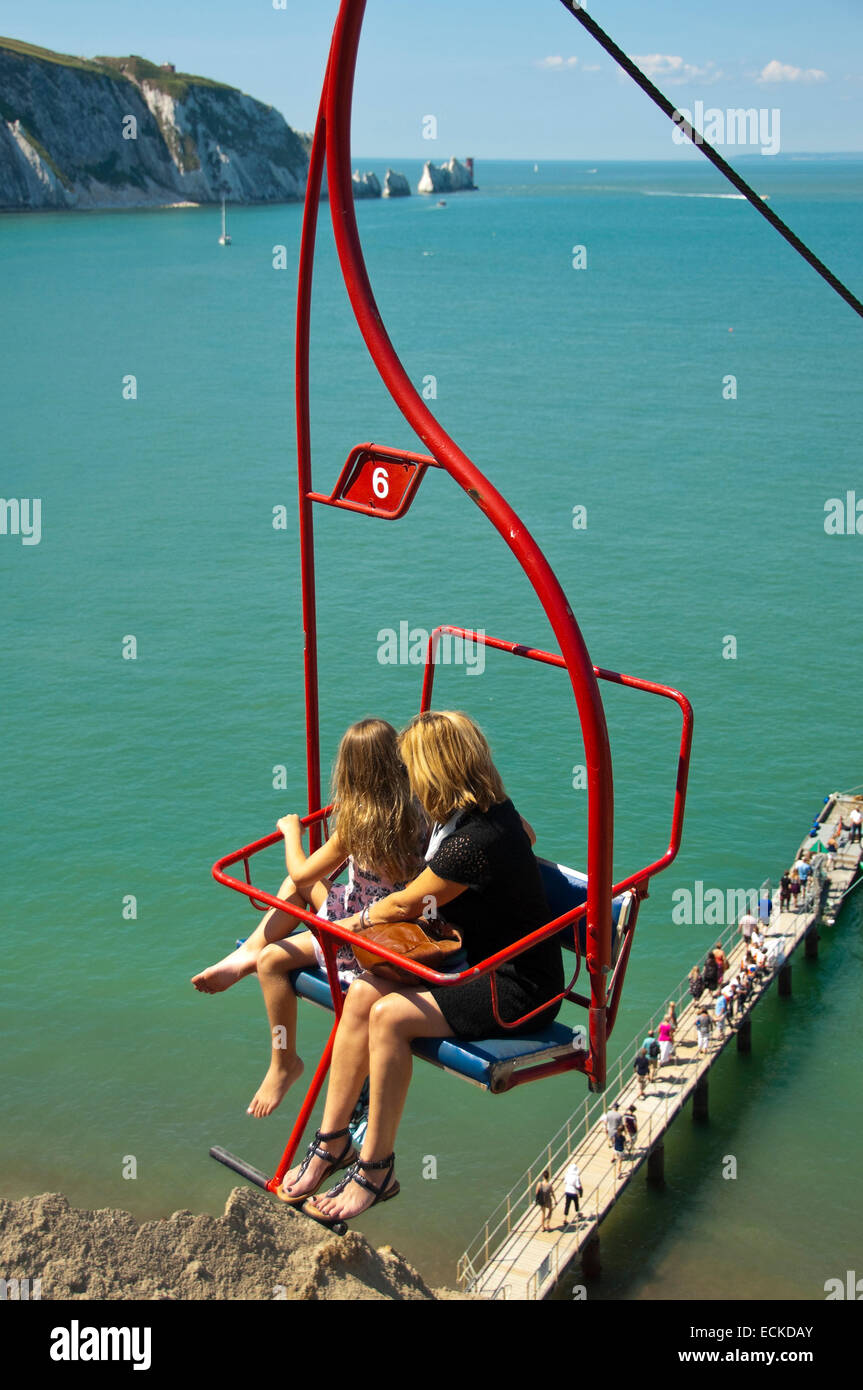 Vertical view of people on the chairlift at the Needles in the Isle of Wight. Stock Photo