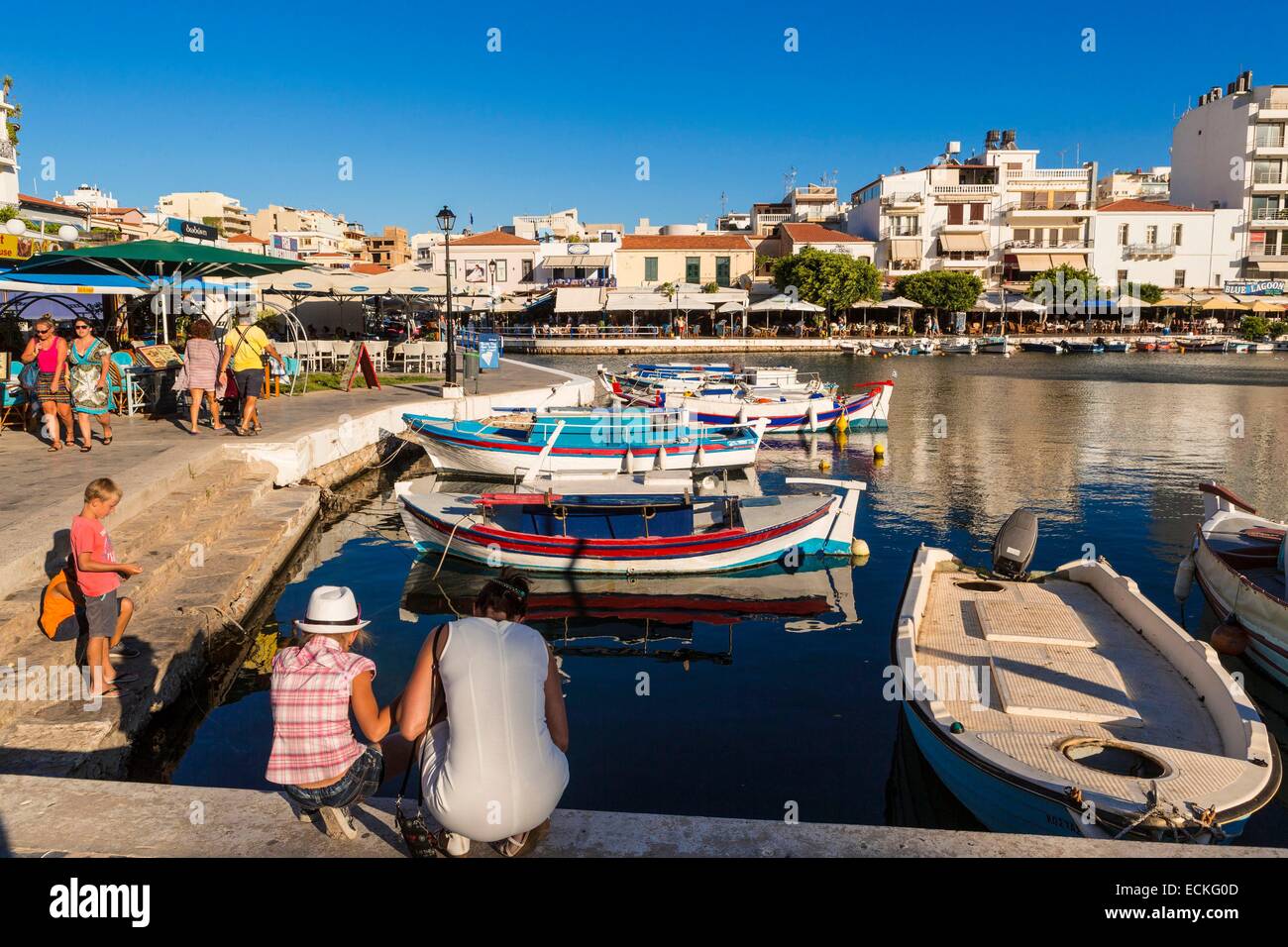Greece, Crete East, Lassithi District, village of Agios Nikolaos and Lake Voulismeni connected to the sea by a channel Stock Photo