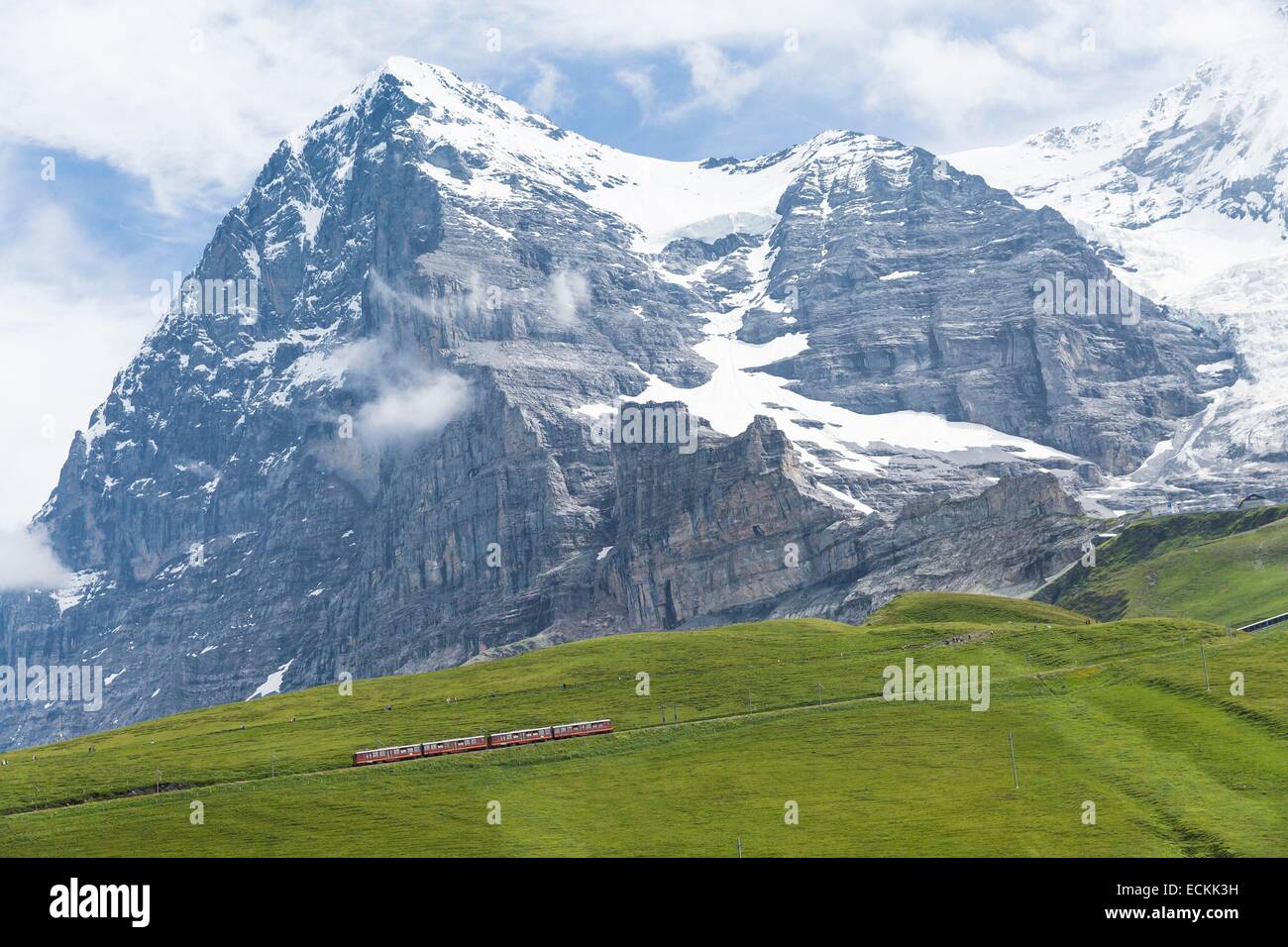 Switzerland, canton of Bern, Grindelwald, listed as World Heritage by UNESCO, train to Jungfraujoch, the highest railway station in Europe and the north face of the Eiger peak Stock Photo