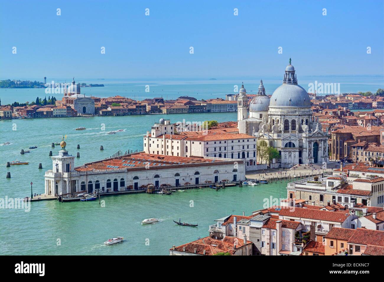 Italy, Veneto, Venice, listed as World Heritage by UNESCO, the Grand Canal in the foreground, the Punta Della Dogana (Customs point) where the Franτois Pinault Foundation is located and Santa Maria Della Salute basilica Stock Photo