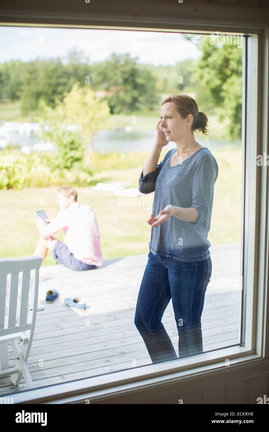 Two women sit on porch hi-res stock photography and images - Alamy