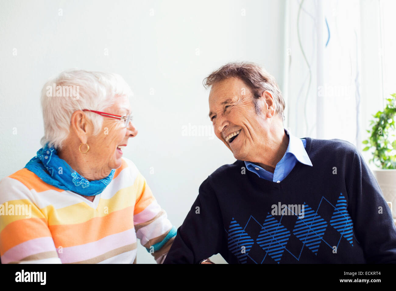 Happy senior couple spending leisure time at nursing home Stock Photo