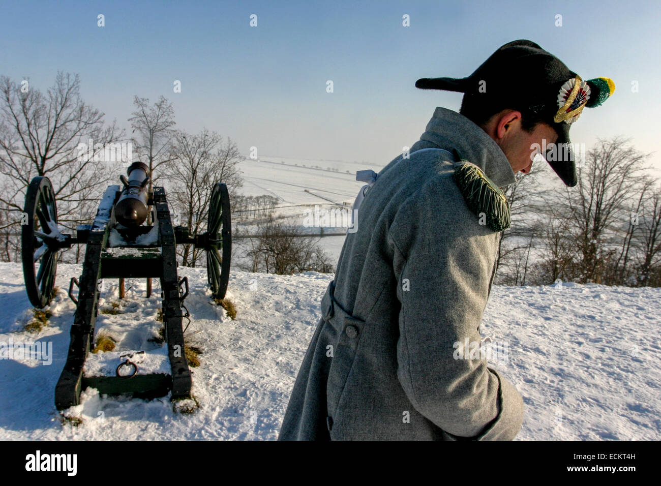 Austerlitz battlefield French Artillery Battery Soldier on top of Santon Hill Napoleonic Wars Reenactment Battle of Austerlitz 1805 Snowy field Stock Photo