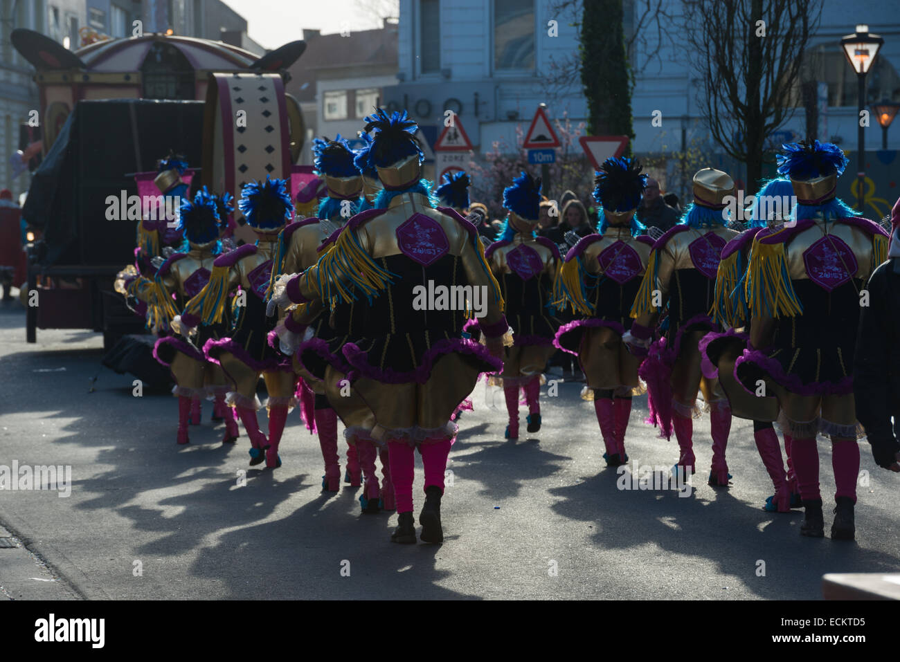 Carnival characters in brightly coloured costumes in the traditionally offensive Aalst Carnival procession, Carnival Monday, Aalst, Belgium Stock Photo
