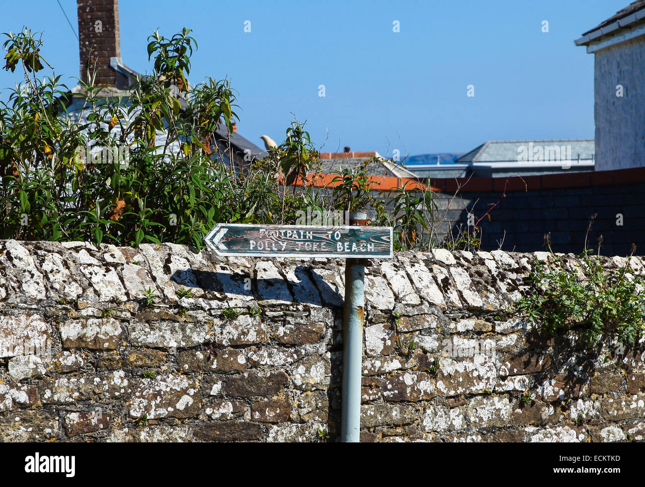 a sign post saying footpath to Polly Joke beach near to Crantock West Pentire Cornwall South West England UK Stock Photo