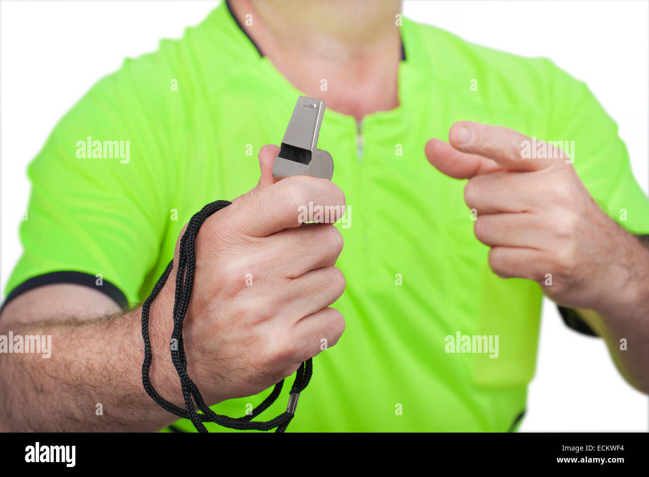 Referee showing his whistle with his hand. Stock Photo
