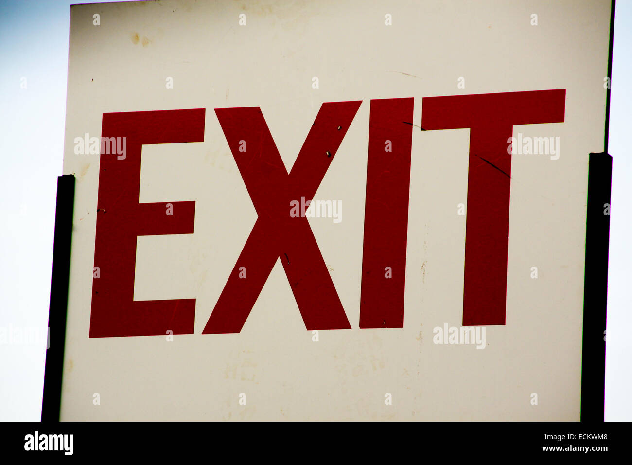 Large Exit sign with red letters on white Stock Photo