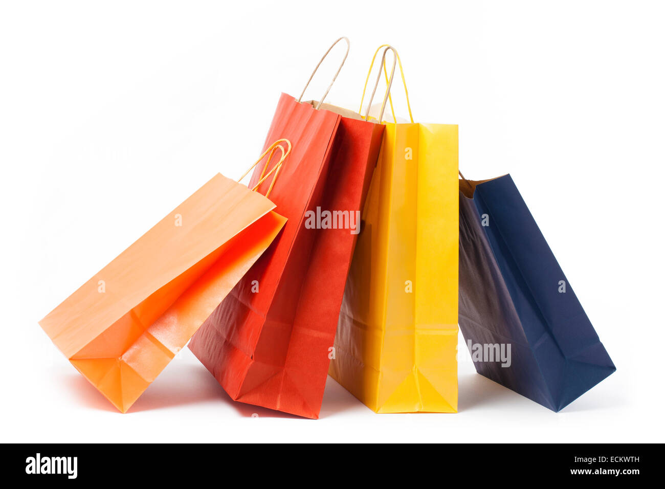 Several color paper bags on white background. Stock Photo