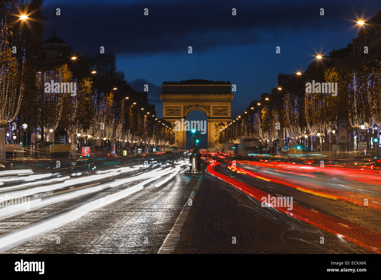 Champs Elysees and the Arch de Triomphe at dusk by Christmas. Stock Photo