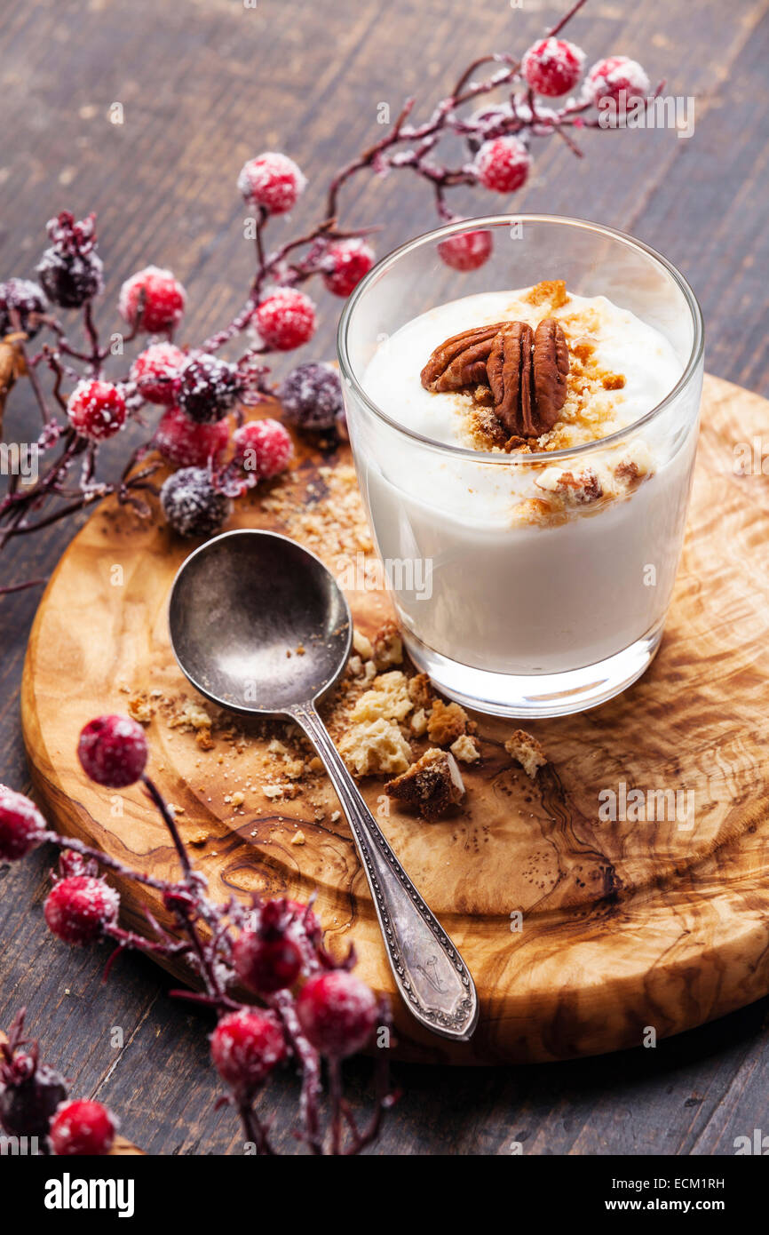 Healthy Cream delicious yoghurt muesli on wooden background with berries Stock Photo