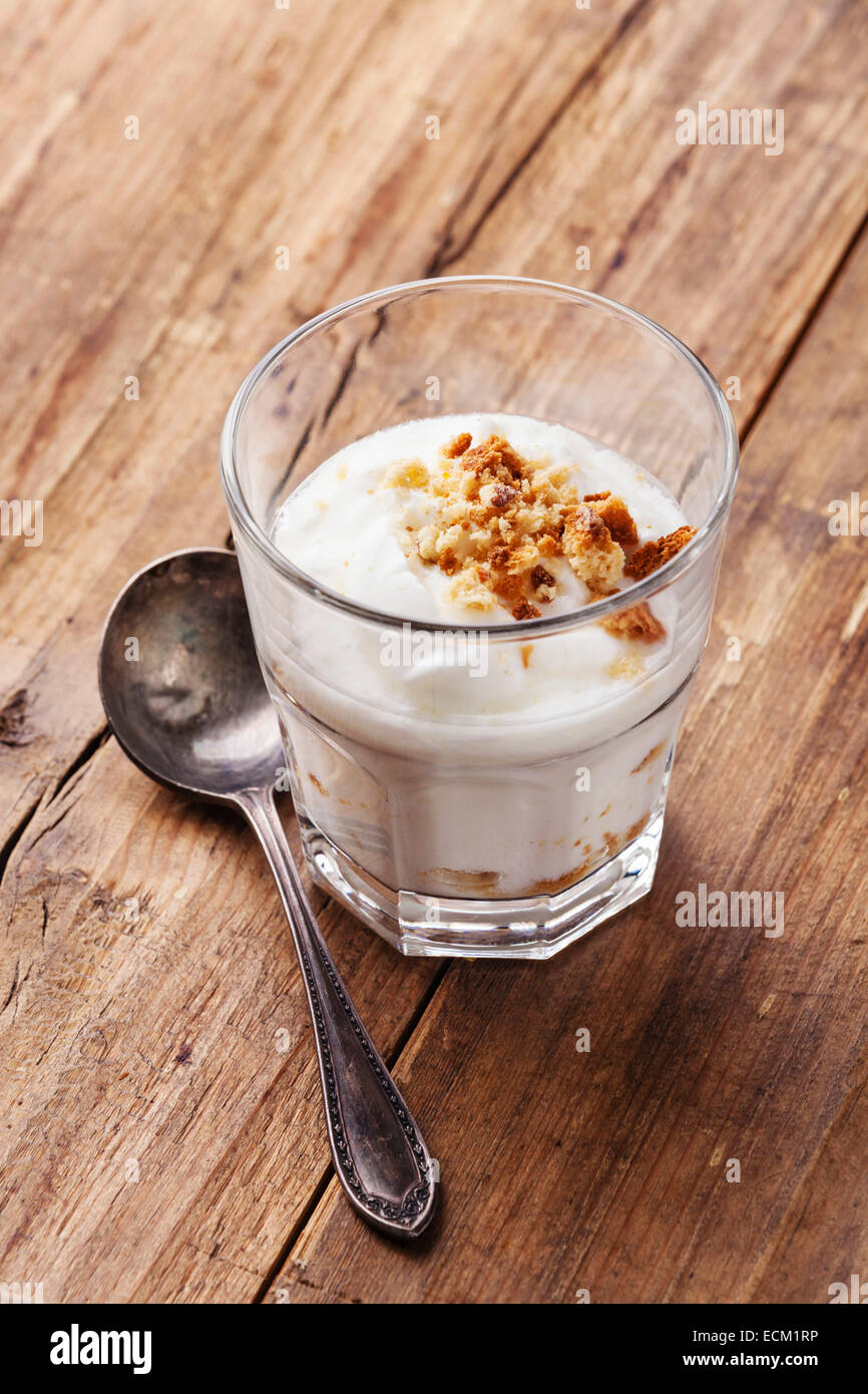 Healthy Cream delicious yogurt muesli on copy space wooden background Stock Photo