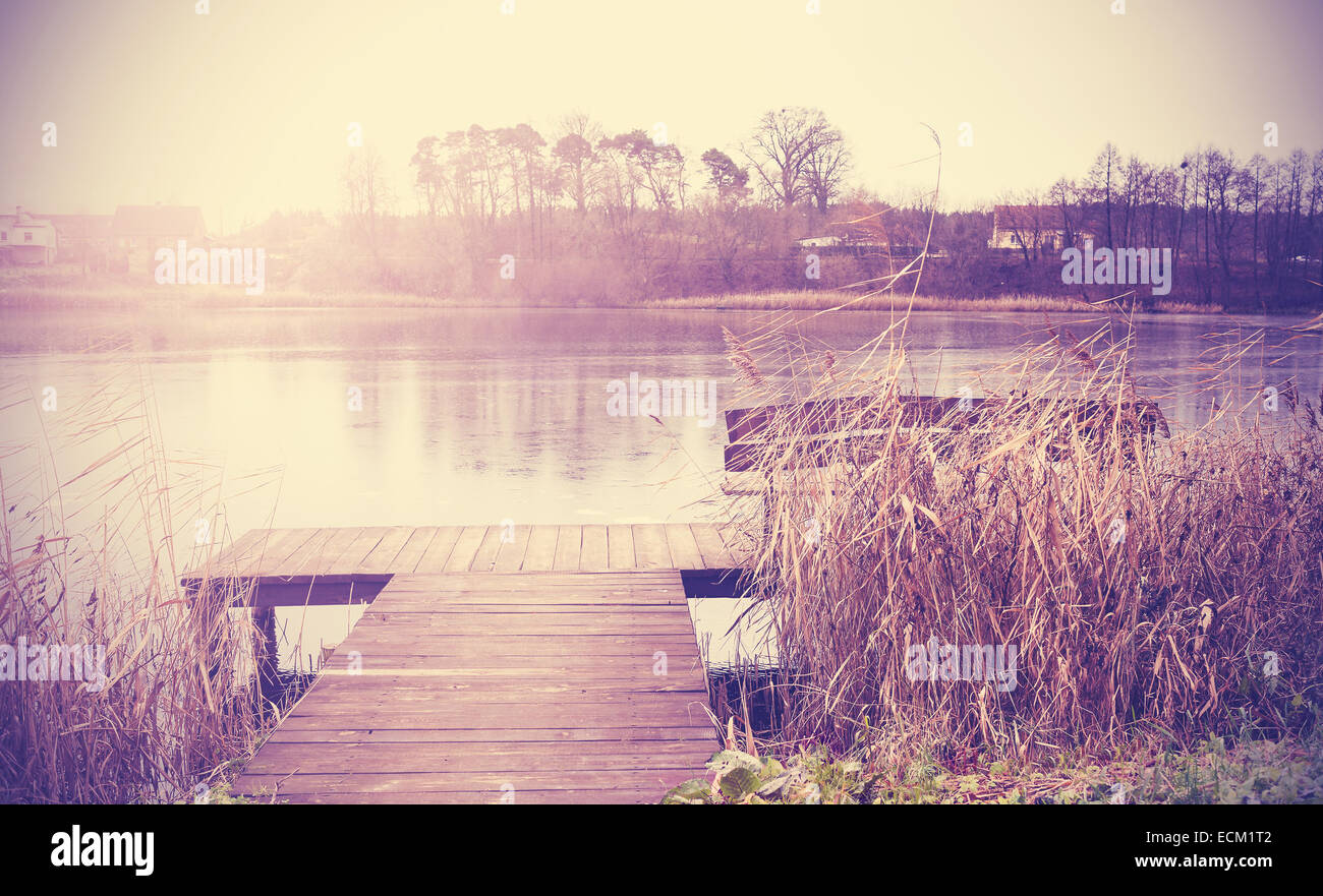Vintage retro toned image of lake in autumn. Stock Photo
