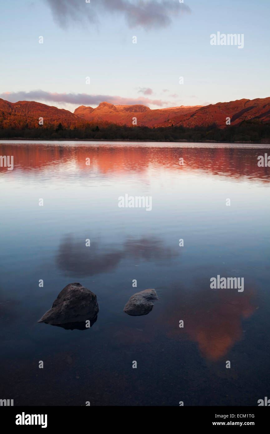 Langdale Pikes reflected in Elter Water, Lake District, UK Stock Photo