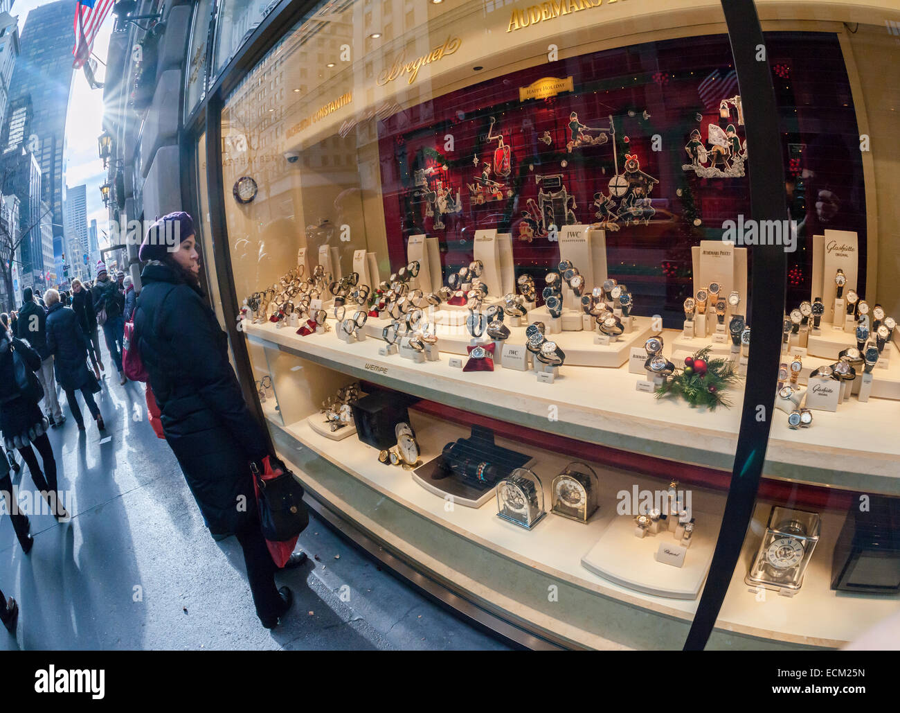 A display of luxury watches is seen in the window of a store in New York on Sunday, December 14, 2014. A recent study on conspicuous consumption reported that New Yorkers spend 597 percent more on watches than the rest of the country. (© Richard B. Levine) Stock Photo