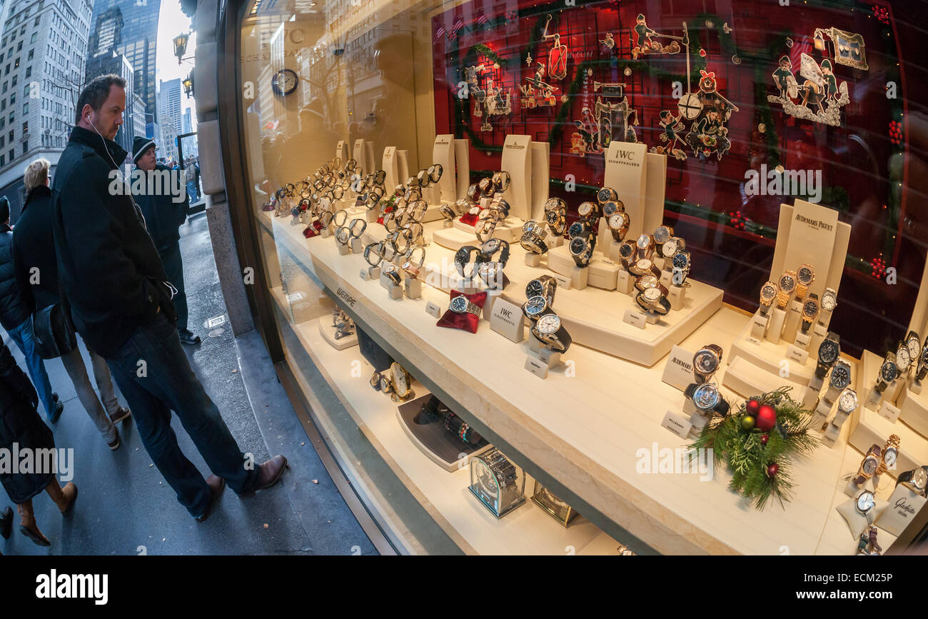 A display of luxury watches is seen in the window of a store in New York on Sunday, December 14, 2014. A recent study on conspicuous consumption reported that New Yorkers spend 597 percent more on watches than the rest of the country. (© Richard B. Levine) Stock Photo