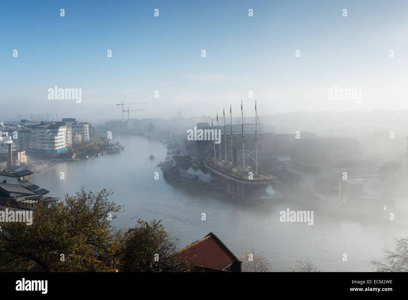 Fog clearing from Bristol Floating Harbour, where the SS Great Britain resides in the dock where she was built. Bristol. UK. Stock Photo