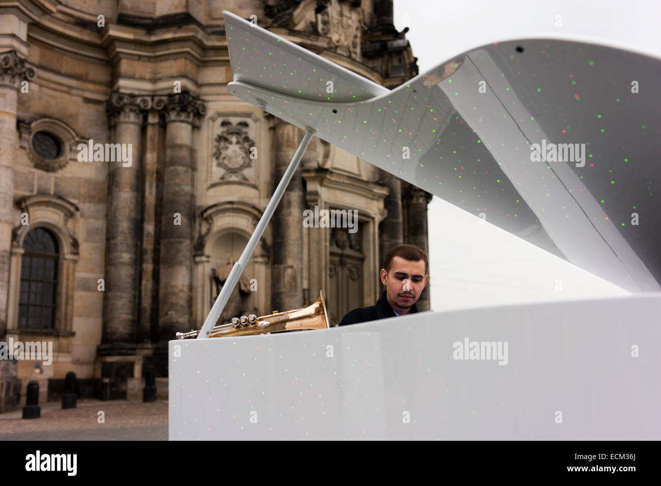 Pianist busking in Dresden's historic district. Stock Photo