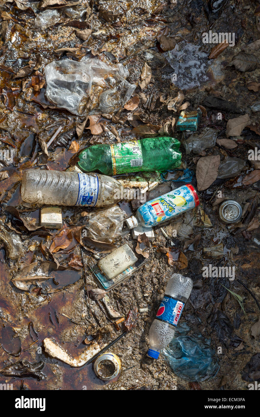 Waste litter in gutter, Miri, Malaysia Stock Photo