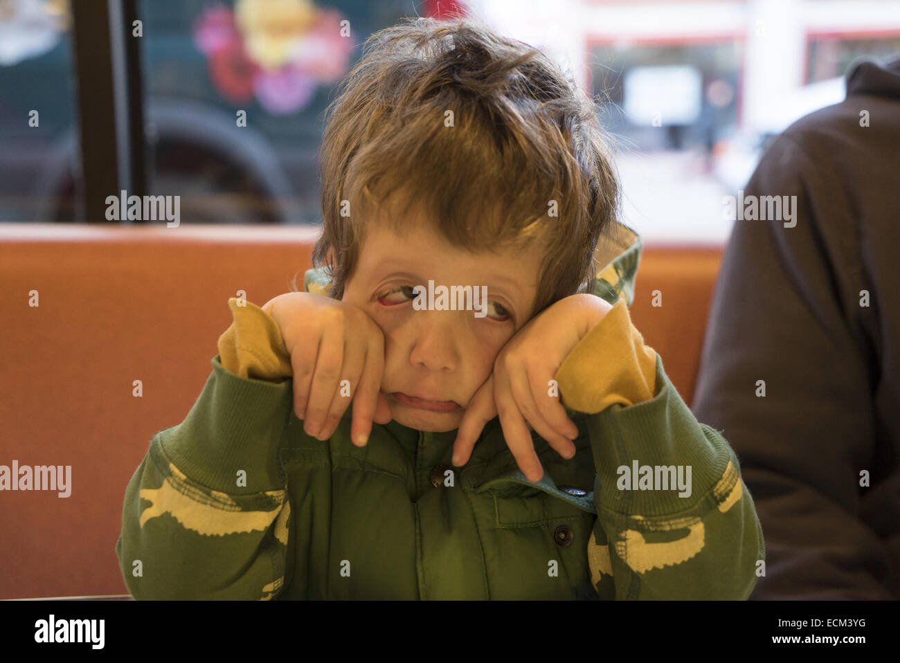 Four year old boy makes a scary face. Stock Photo