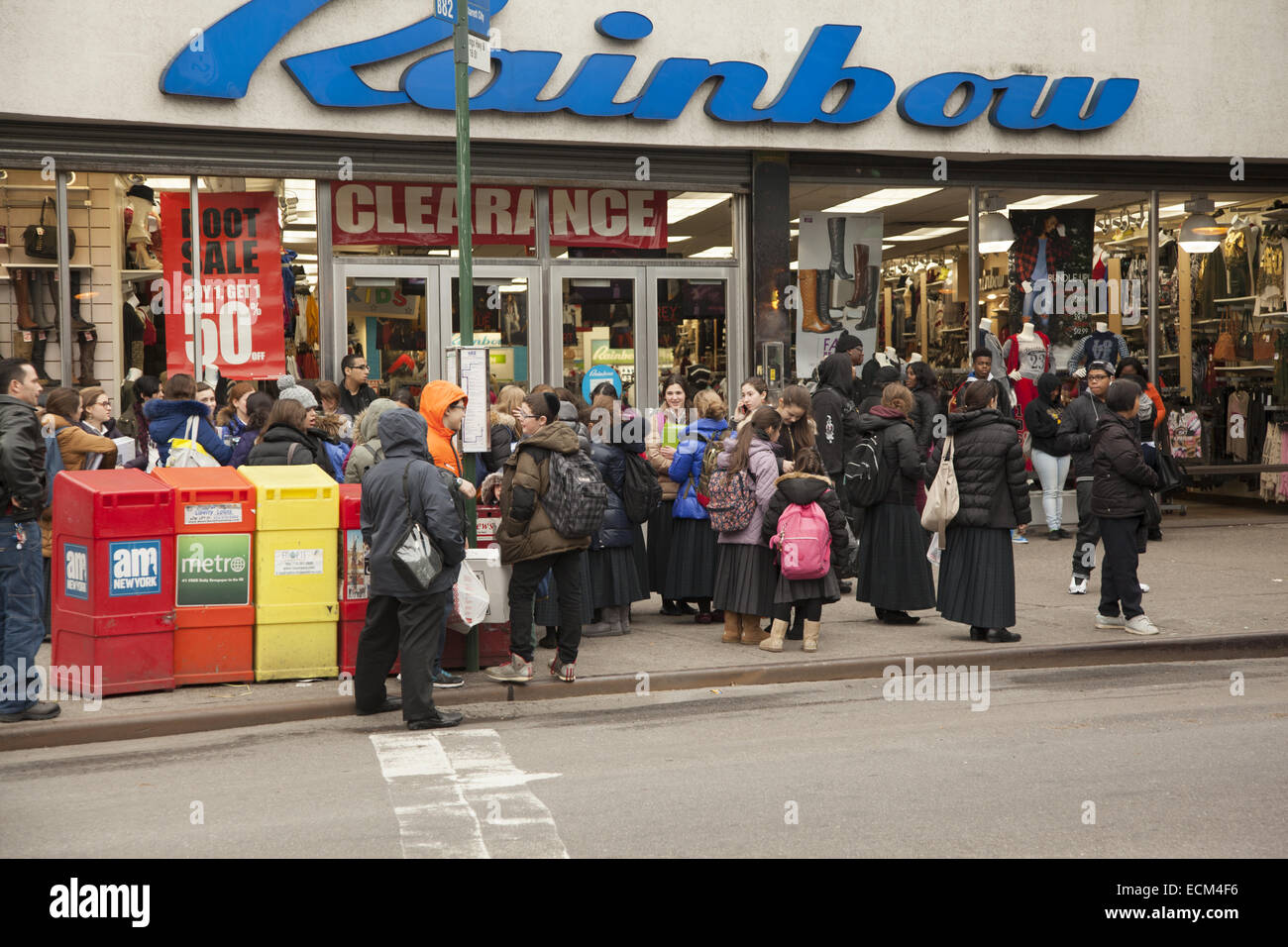 Mostly Jewish school children wait for a bus to go home from school on Kings Highway in Brooklyn, NY. Stock Photo