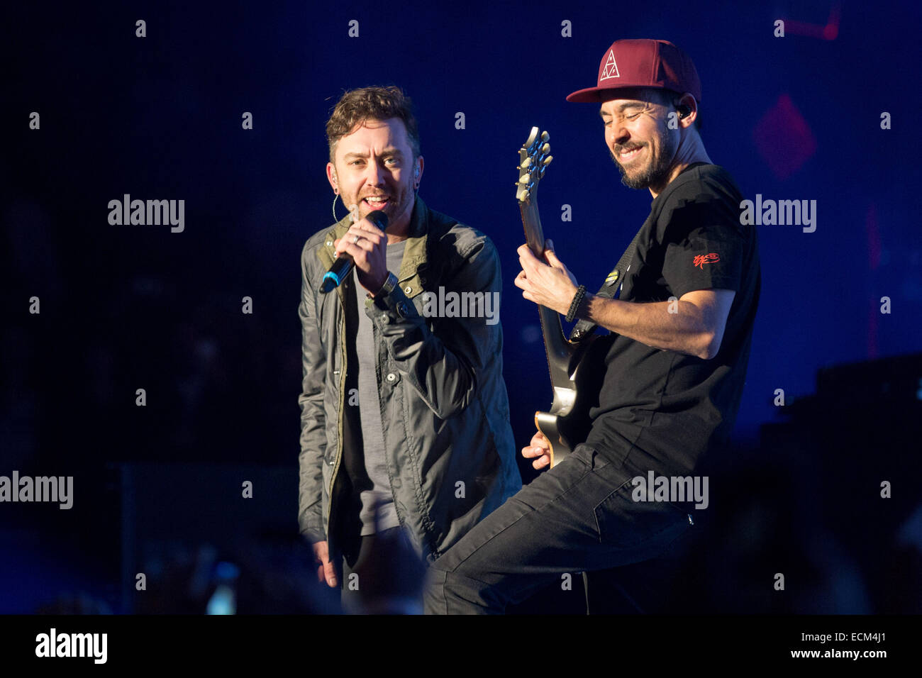 Inglewood, California, USA. 14th Dec, 2014. MIKE SHINODA (R) of Linkin Park and TIM MCILRATH (Rise Against) perform live in concert at the 25th annual KROQ Almost Acoustic Christmas at The Forum in Inglewood, California © Daniel DeSlover/ZUMA Wire/Alamy Live News Stock Photo