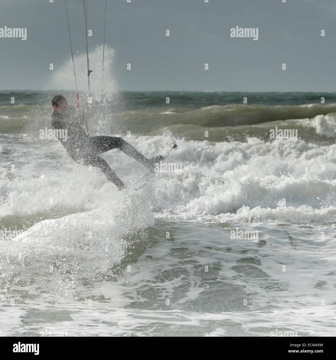 Kiteboarding in strong winds a big seas at Porth Neigwl, North Wales