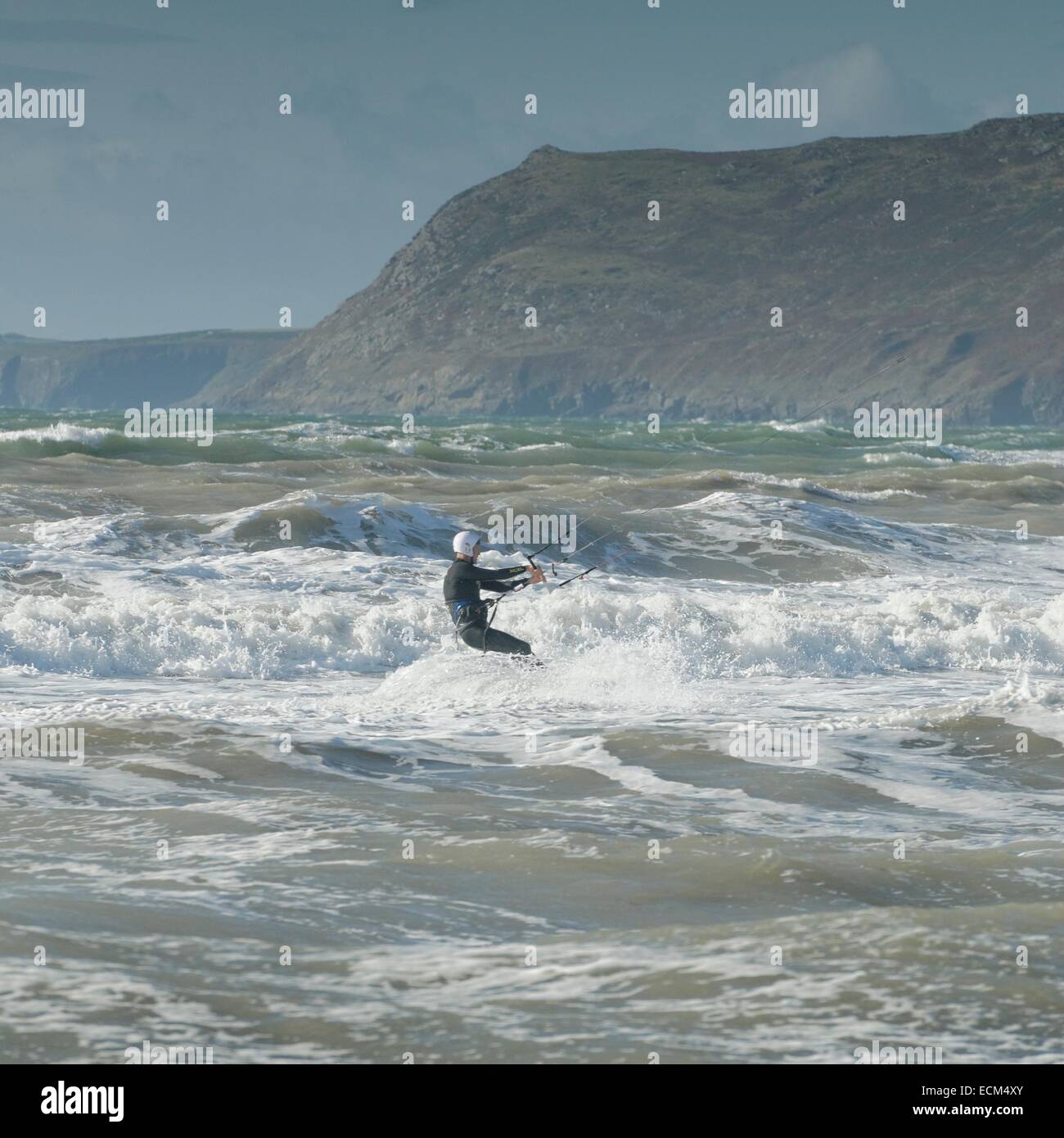Kiteboarding in strong winds a big seas at Porth Neigwl, North Wales
