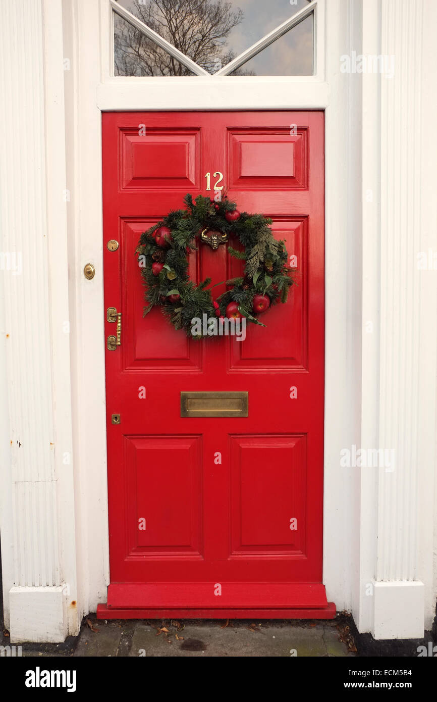 Big house front doors with Christmas wreaths as decoration, in Bristol