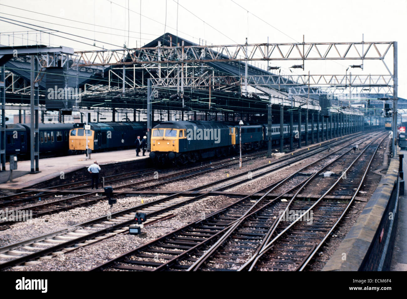 british rail diesel and electric locomotives at rugby station england uk during the 1980s Stock Photo