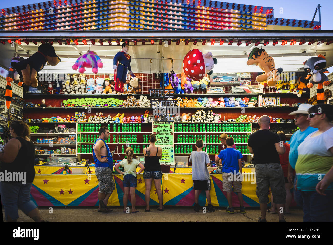 people playing carnival game Stock Photo Alamy