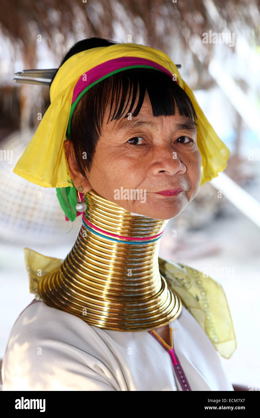 Giraffe women wearing brass rings on their necks in the Long Necked Karen village in Chiang Rai province in Thailand Stock Photo