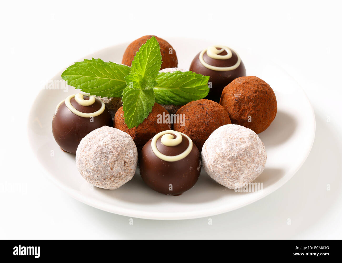 Delicious chocolate truffles with ganache filling Stock Photo Alamy
