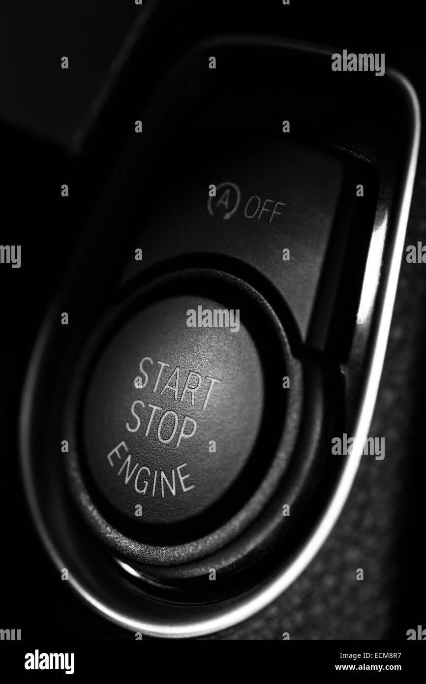 Detail on a black start button in a car. Stock Photo