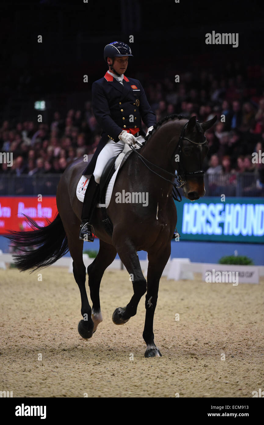 London, UK. 17th Dec, 2014. Olympia London Horse Show-Reem Acra FEI World Cup dressage leg grand prix. British rider Carl Hester and Nip Tuck 4th Place Credit:  Action Plus Sports/Alamy Live News Stock Photo