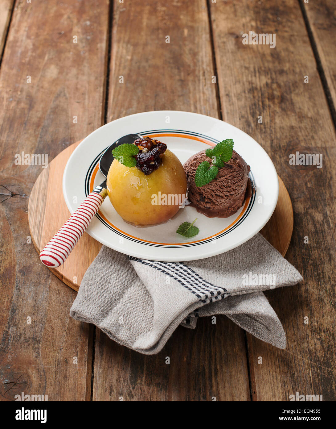 baked apples and ice cream Stock Photo