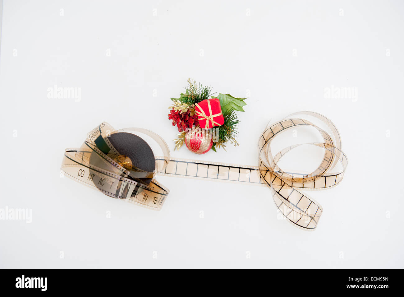 Film reel with christmas decoration isolated on white background Stock Photo