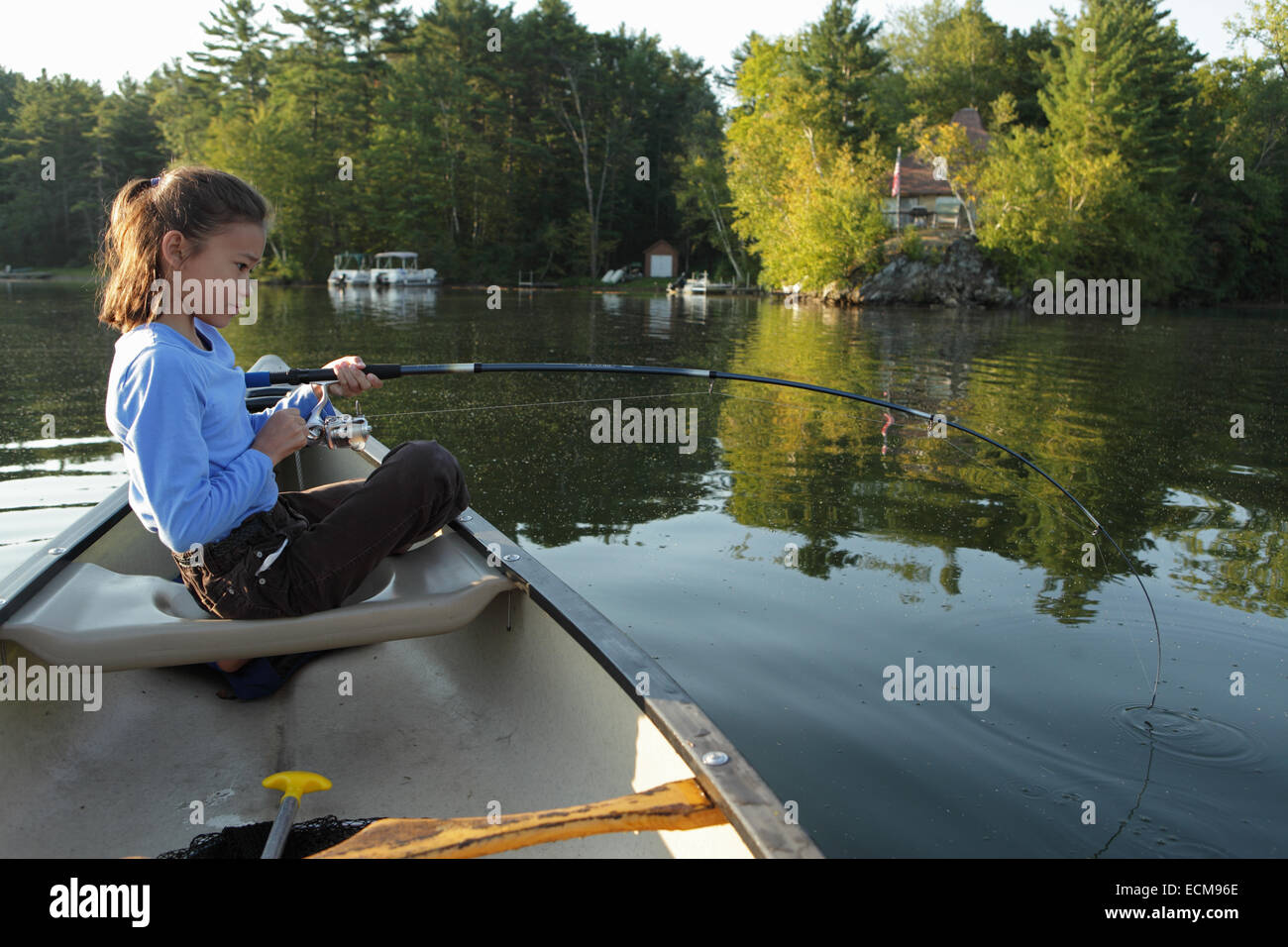Catching fish from canoe hires stock photography and images Alamy
