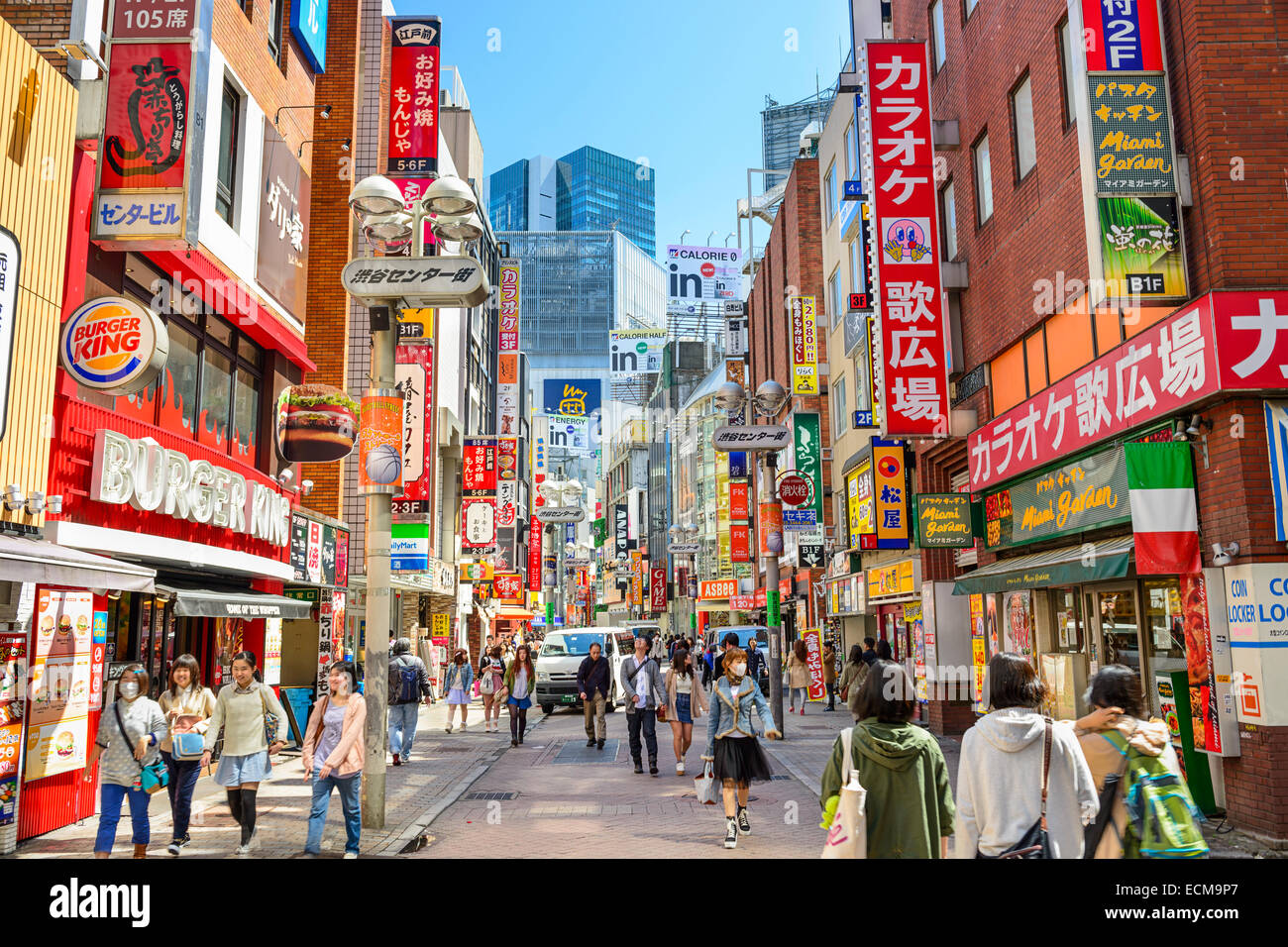 Shoppers in Shibuya, Tokyo. The area is a popular destination for fashion and shopping. Stock Photo