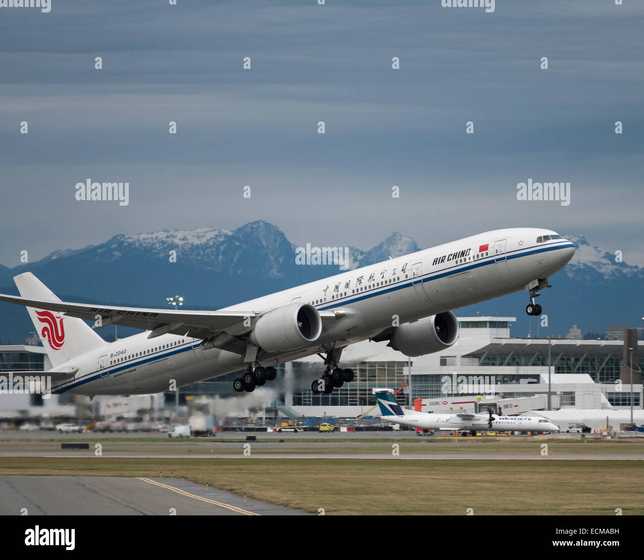 Air China Boeing 777-300ER (B-2040) airliner departs from Vancouver International Airport, Canada. Stock Photo