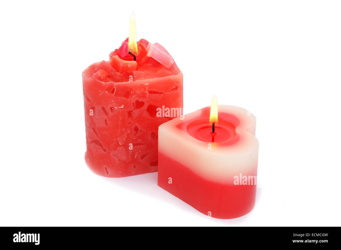 Red candles isolated on white background. Stock Photo