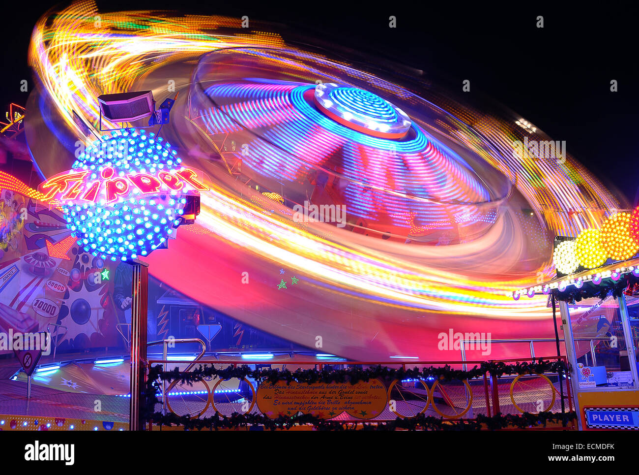 Fairground ride, long exposure, Hamburger Dom funfair, Hamburg, Germany