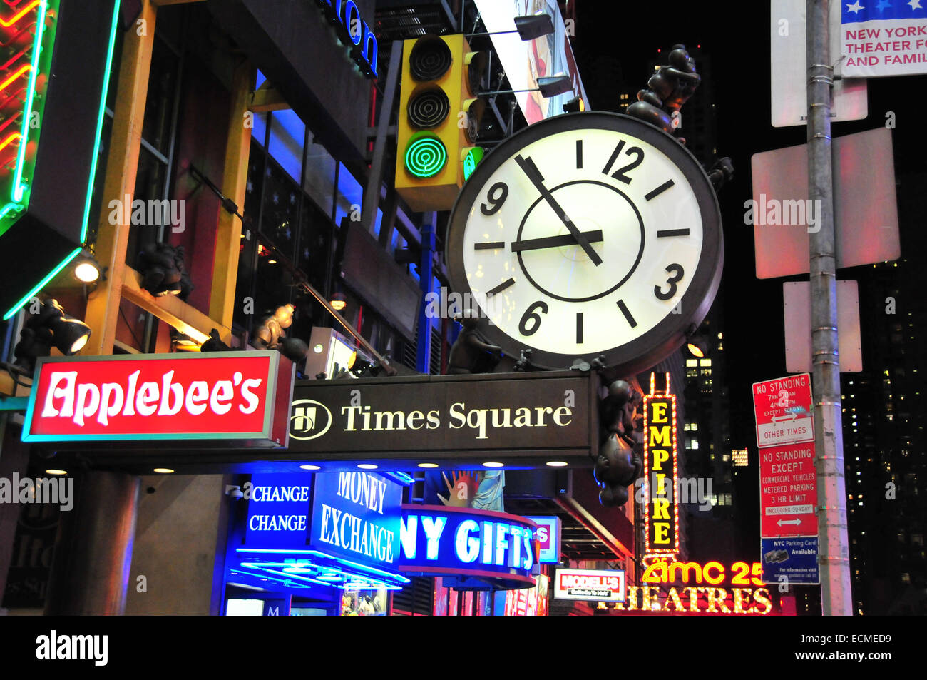 Clock and neon signs, Times Square, New York City, New York, United