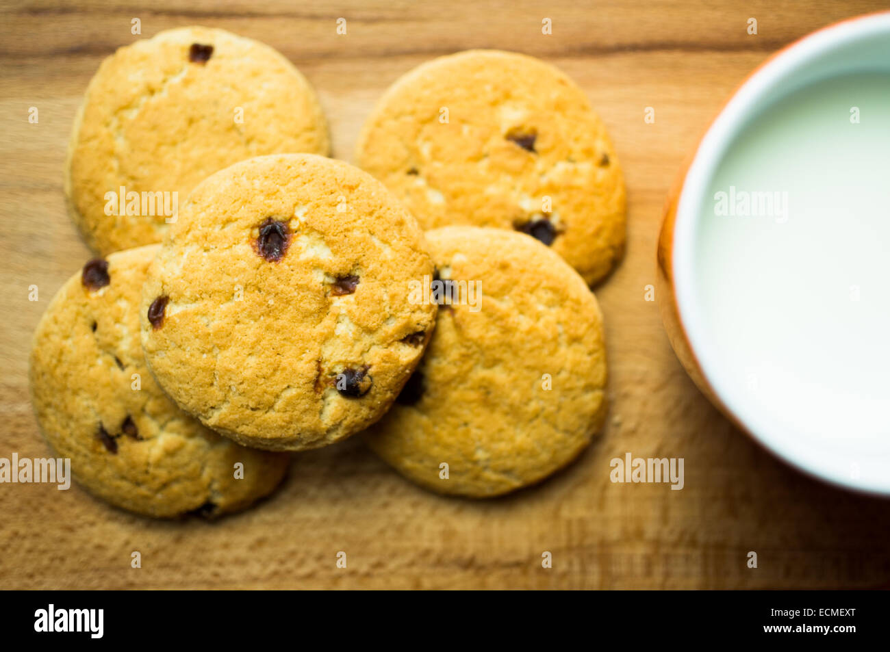 Shortbread cookies with raisins and a glass of milk Stock Photo - Alamy