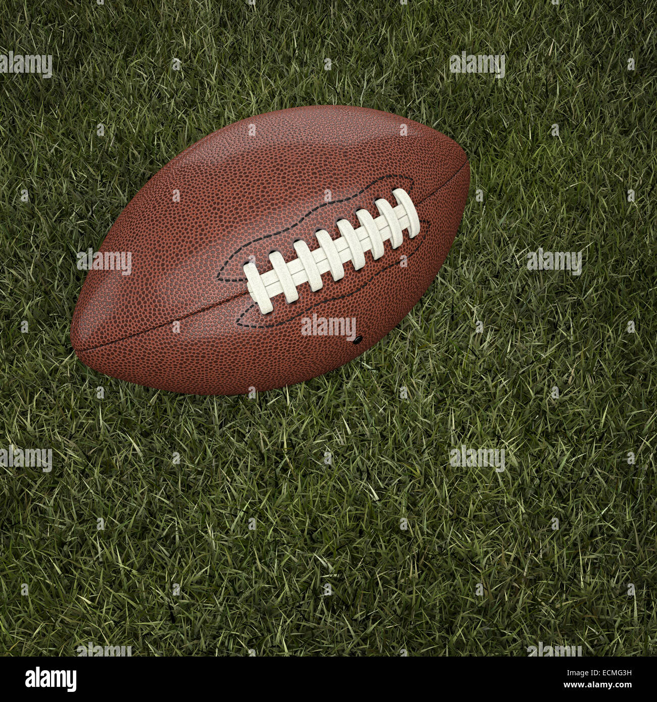 american football ball on grass Stock Photo