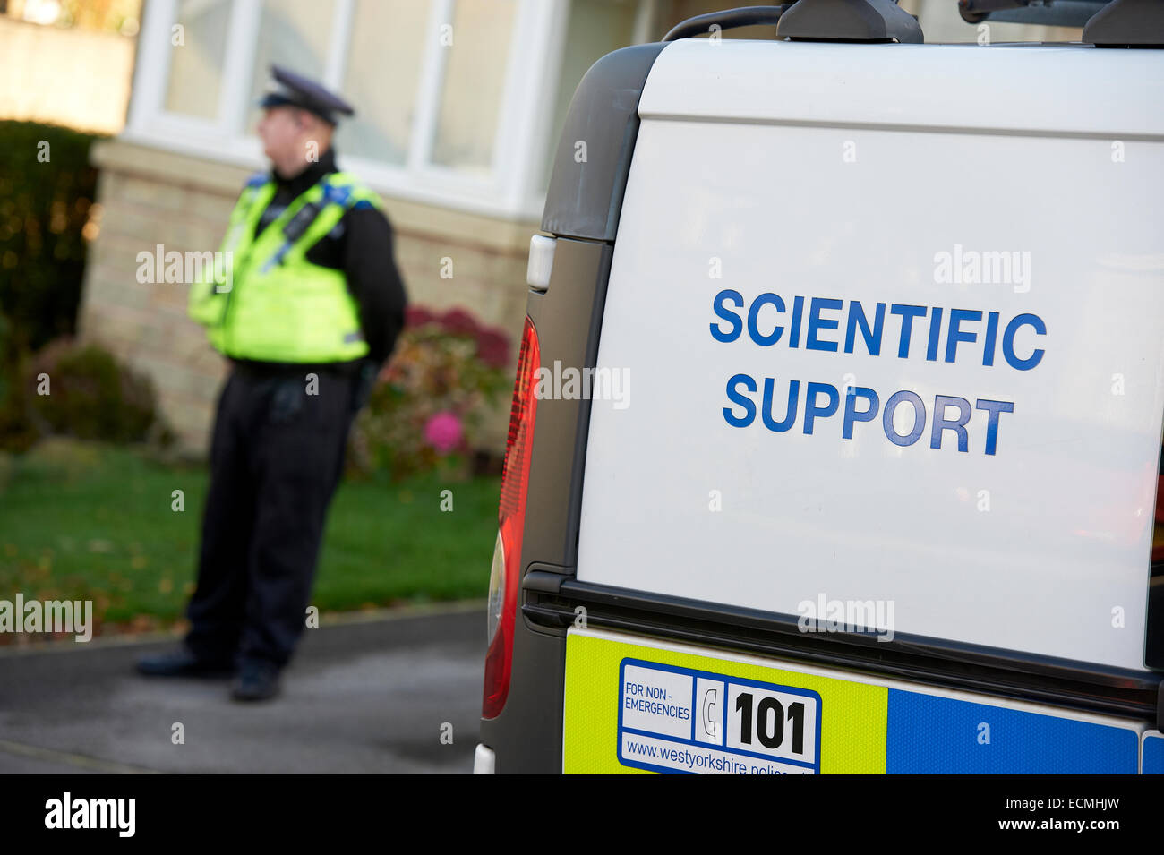 UK Police officer and Scientific Support Unit, CSI Unit. Stock Photo