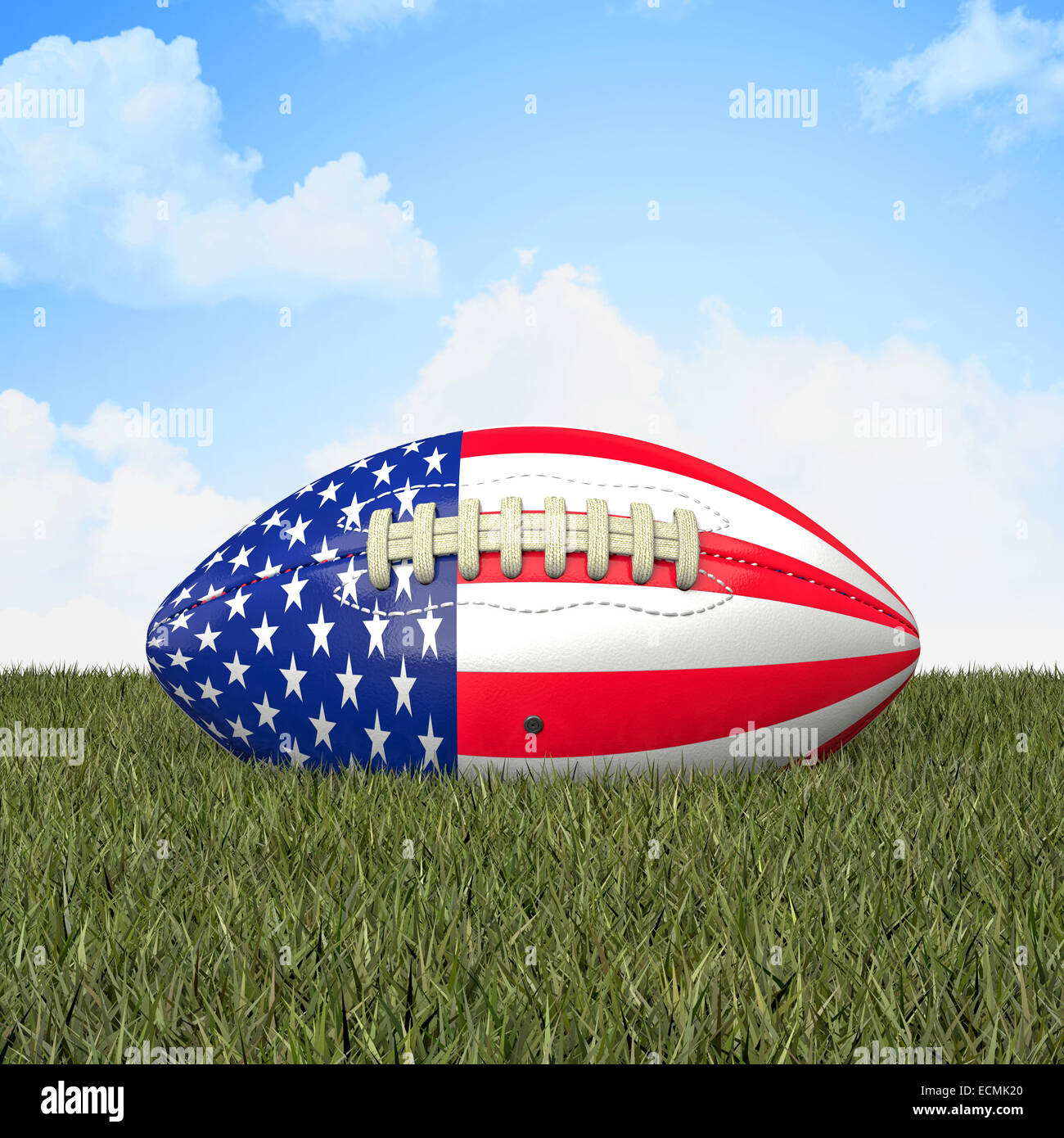 american football ball with usa flag on grass Stock Photo