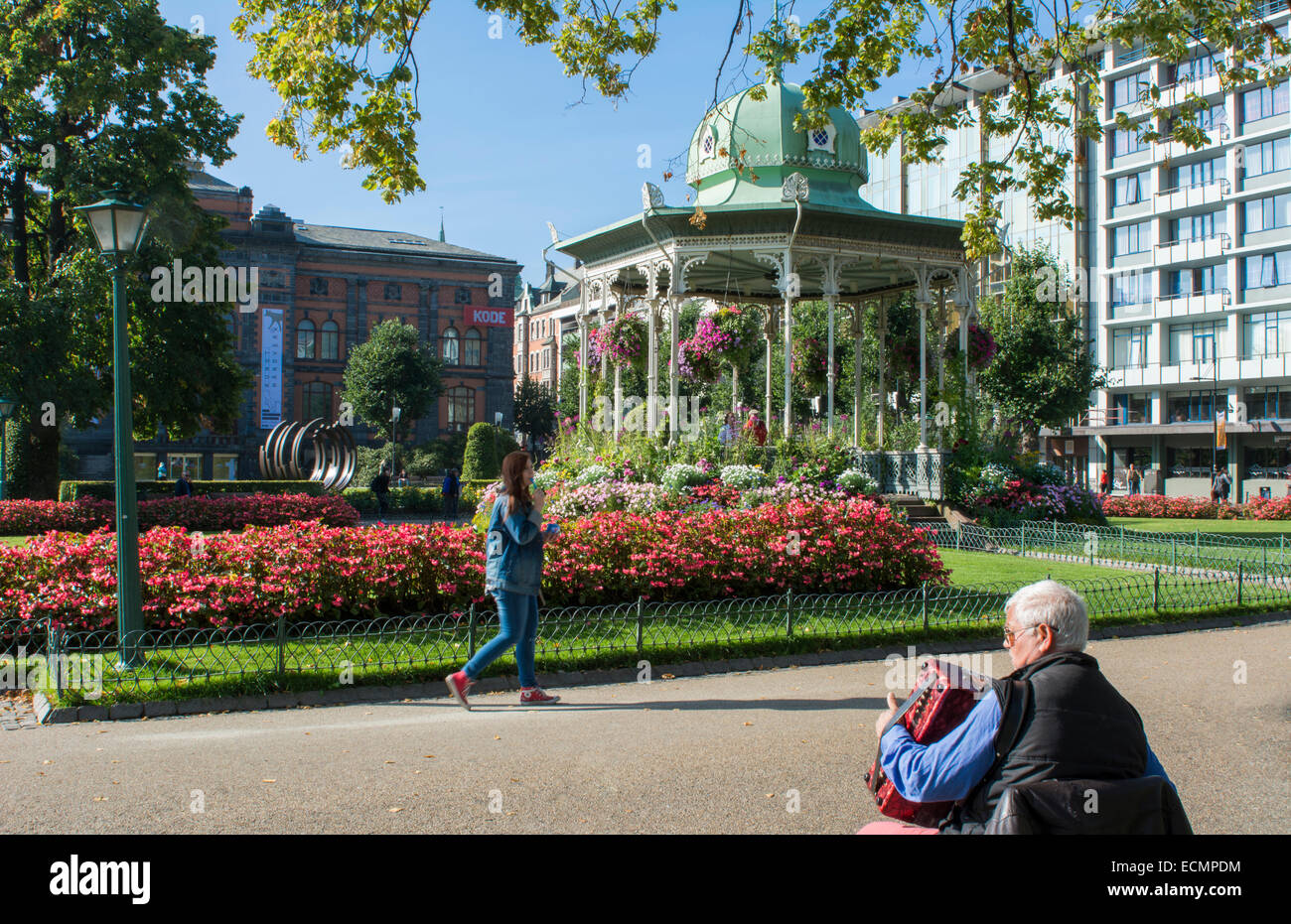 Bergen Norway music Pavillion colorful gazebo with flowers in downtown  with local man playing accordian miusic Stock Photo