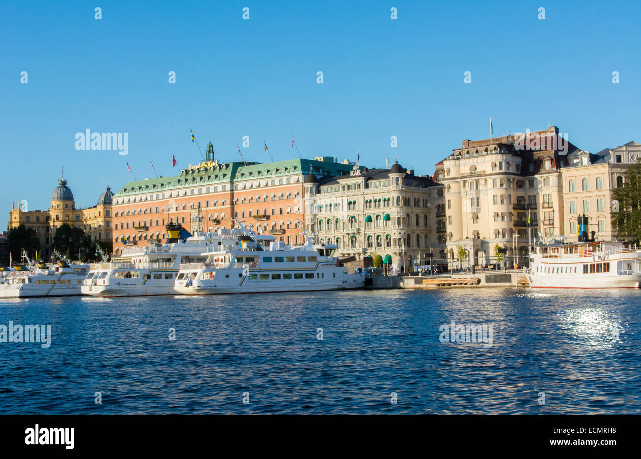 Stockholm Sweden Grand Hotel and city skyline with boats from cruise
